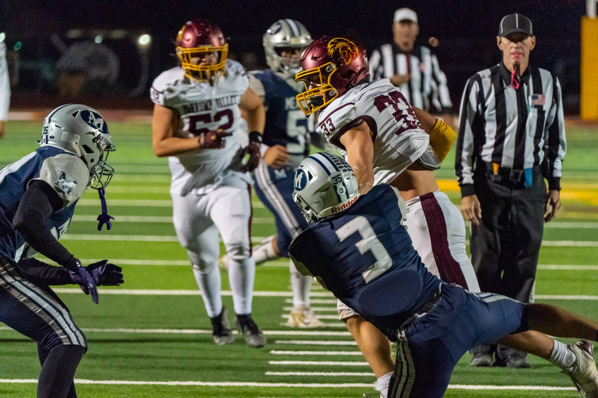 Pahrump Valley High School senior captain Austin Alvarez powers one through the goal line to sh ...