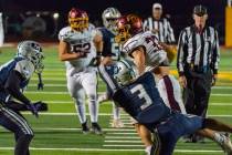 Pahrump Valley High School senior captain Austin Alvarez powers one through the goal line to sh ...