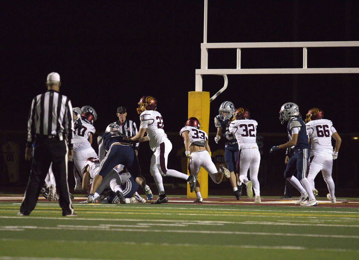 PVHS's senior ATH/WR/FS Austin Alvarez finds a hole through The Meadows defensive line to find ...