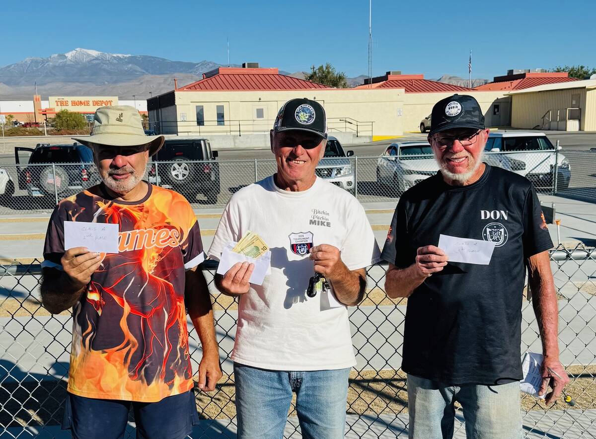 NSHPA pitchers Jim Magda (left), Mick Nicosia (middle) and Don Brown (right) show the winnings ...