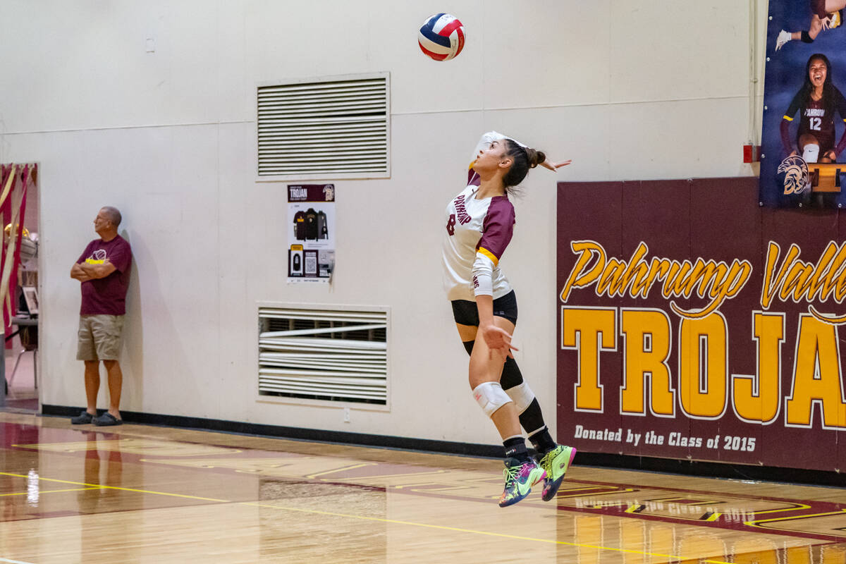 PVHS junior Xe'ane Kamanu prepares to send a serve over to The Meadows in the Trojans senior ni ...