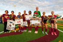 The 2025 Pahrump Valley High School girls soccer seniors line up before the start of their last ...