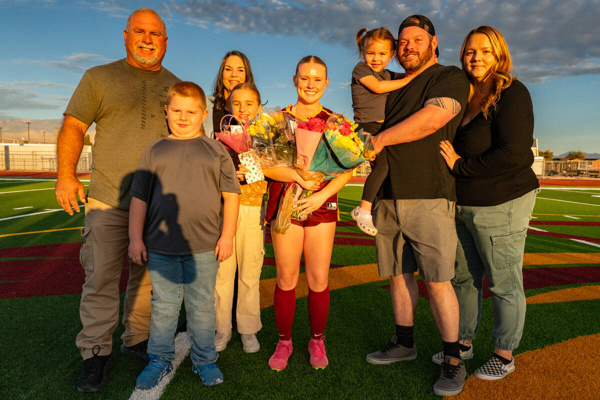 PVHS girls soccer co-captain Aubrey Williams poses on her senior night with her family before t ...