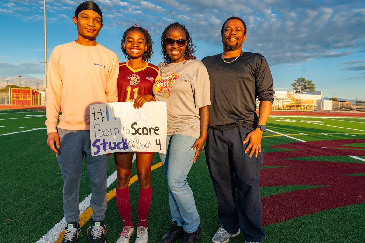 PVHS girls soccer senior Diona Nixon proudly poses on her senior night with her family before t ...
