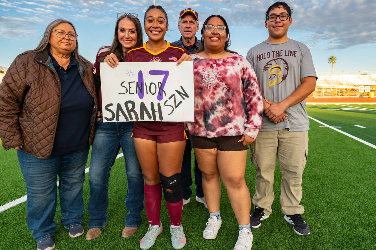 PVHS girls soccer senior Sarah Brown-Collins proudly poses on her senior night with her family ...