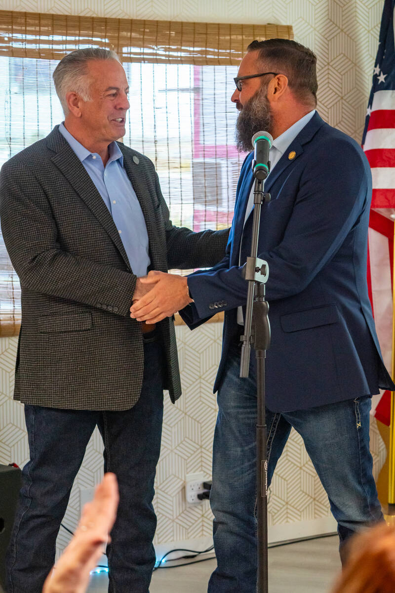 Gov. Joe Lombardo (left) introduced District 36 Assemblyman Gregory Hafen II (right) to the aud ...
