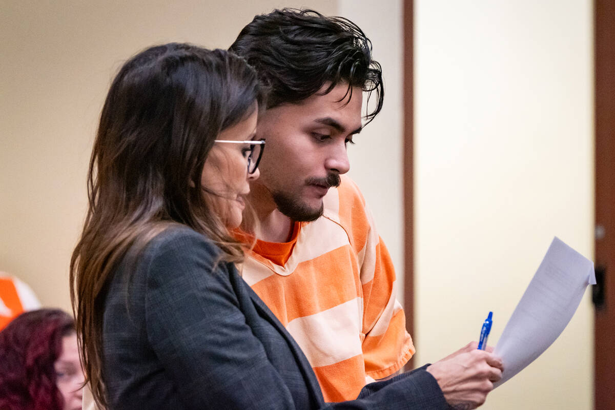 Attorney Ava Bravo speaks with her client Fabian Ferrante during the hearing. (John Clausen/Pah ...