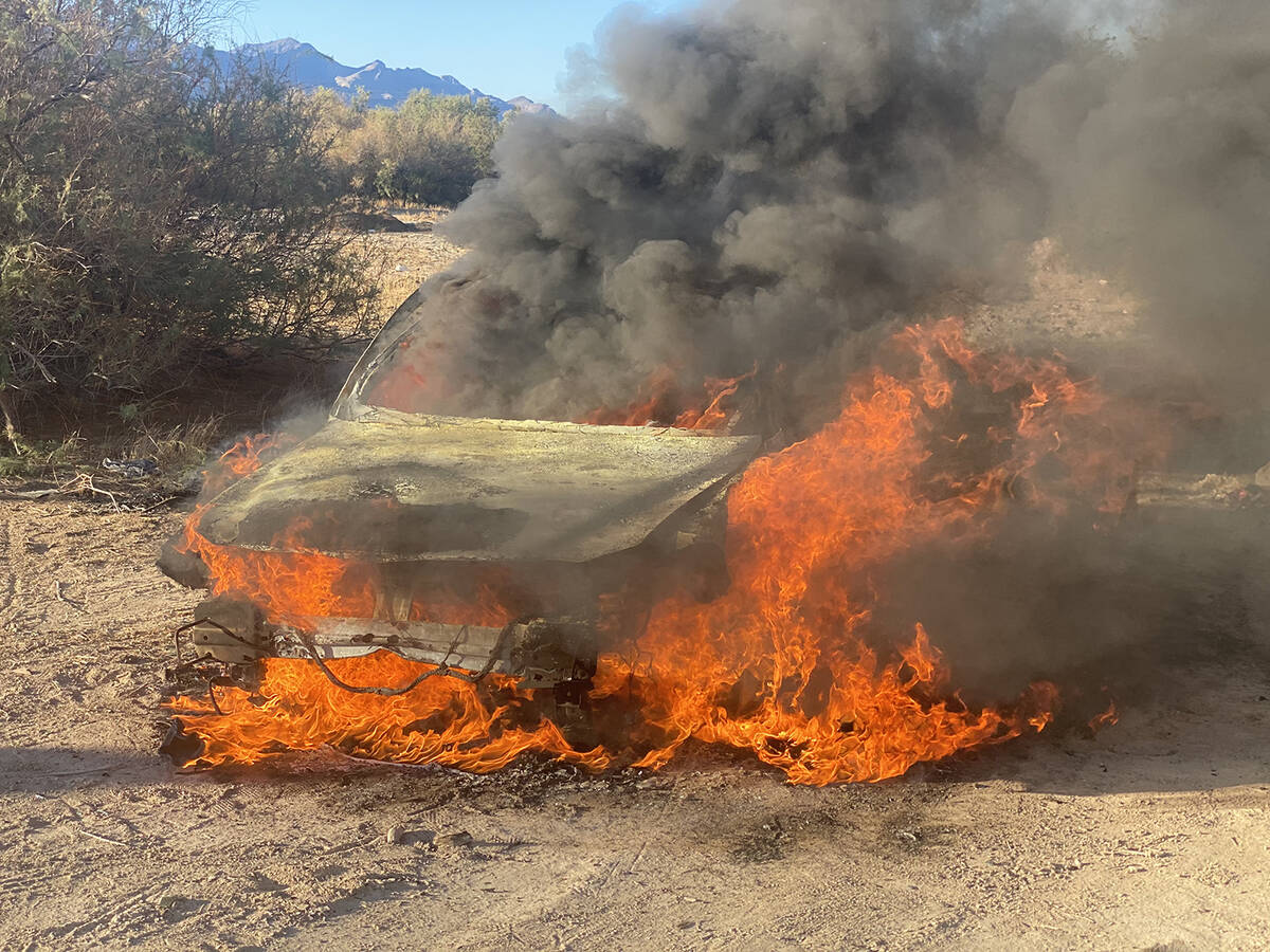 An unoccupied vehicle engulfed in flames was found on the desert floor off North Leslie Street. ...
