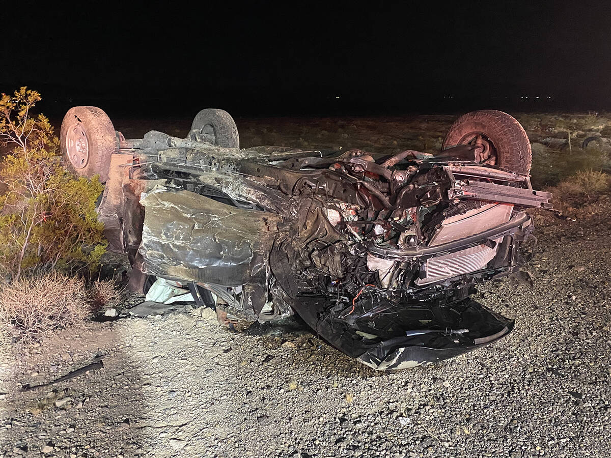 One of the vehicles was resting on its roof after a head-on collision on Highway 95. (Pahrump V ...