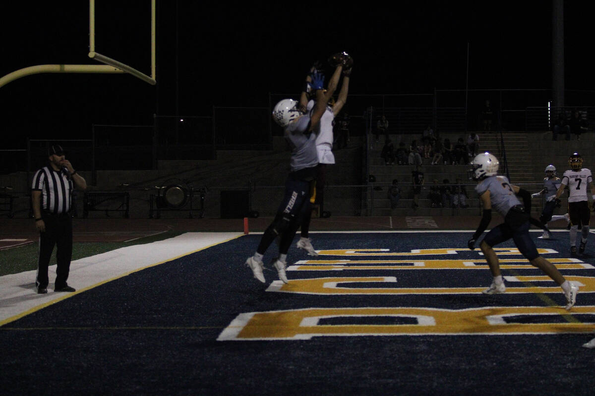 PVHS senior S/WR Booey Mclard makes a goal-line interception to put an end to the Boulder City ...