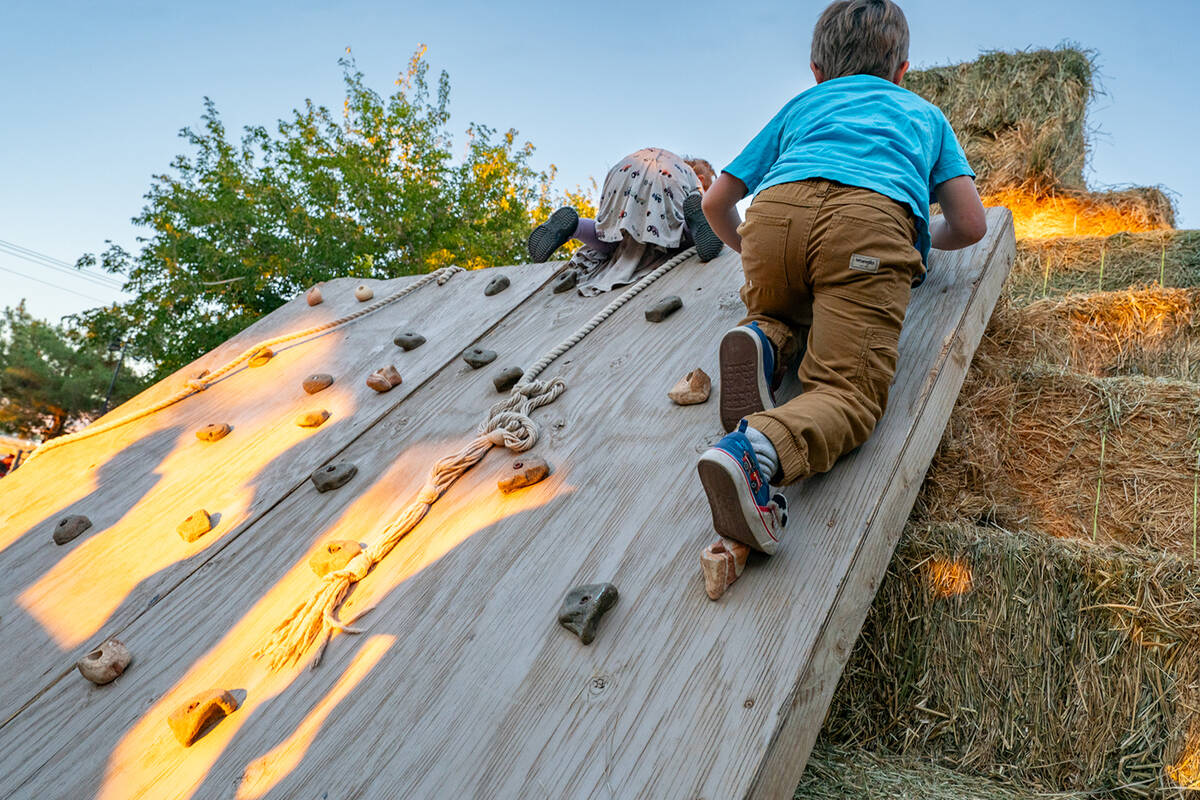 The event's hay-bale pyramid play area was enjoyed by many children. (John Clausen/Pahrump Vall ...