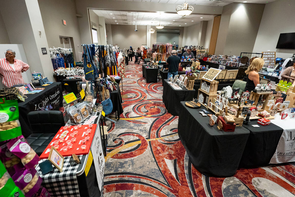 In addition to lectures, attendees browsed an adjacent room filled with 23 local vendors offeri ...
