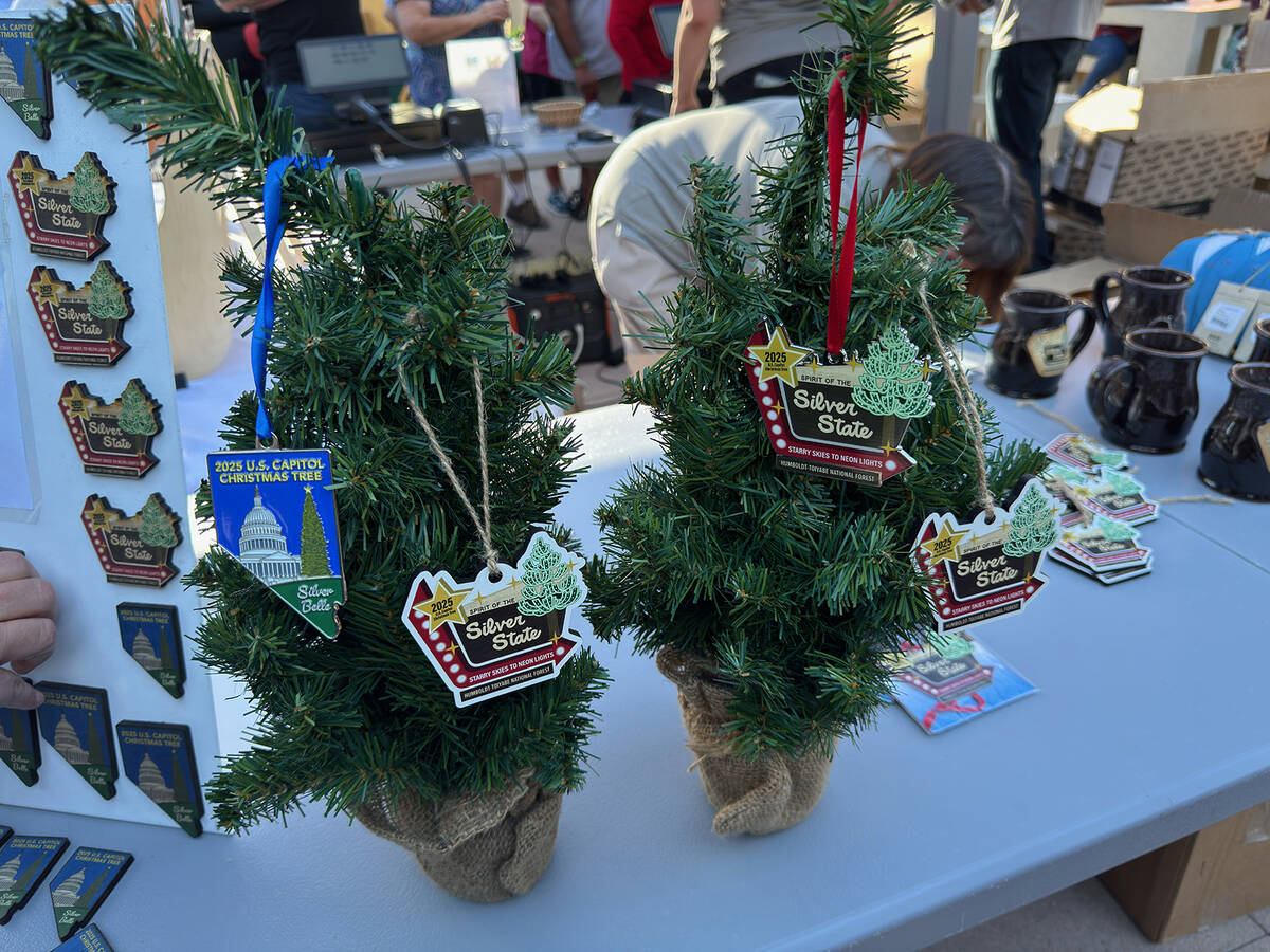 Logo-decorated memorabilia, including magnets, ornaments, mugs and clothing were in high demand ...