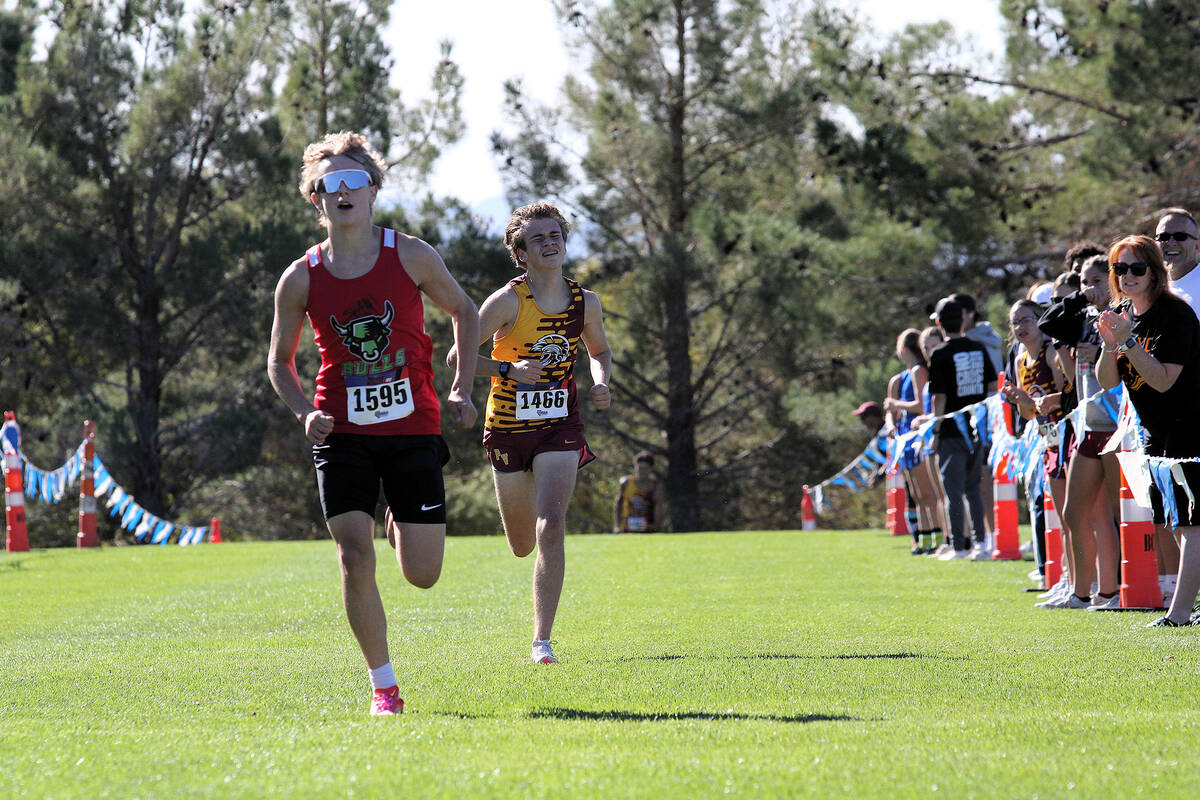 PVHS boys XC junior Logan Tilley is hot on SLAM! Academy senior Thomas Delaney as Tilley finish ...