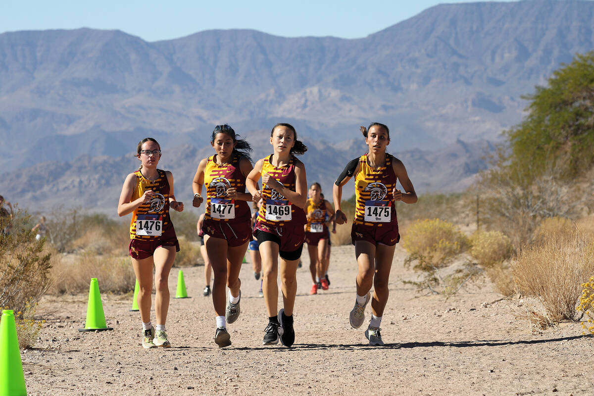 The PVHS girls XC team is led in the front four by junior Kaylan Robinson (left), junior Sophie ...