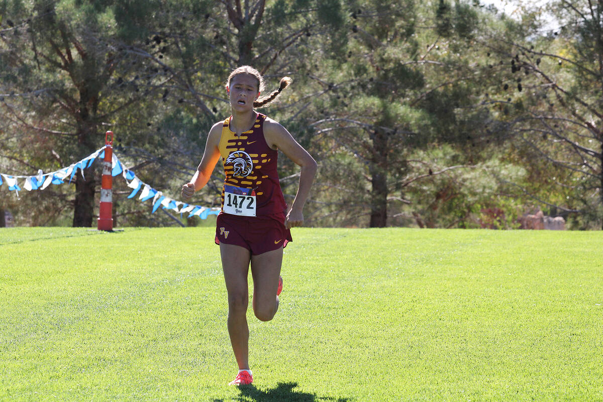 PVHS girls XC junior Rosie Miller pushes till the very end during the Class 3A Southern Regiona ...