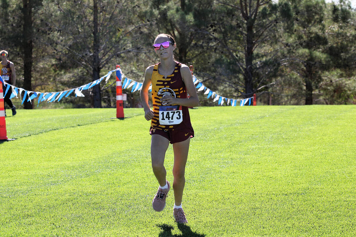 PVHS XC sophomore Adelin Nelson gives everything she has left before nearing the finish line du ...
