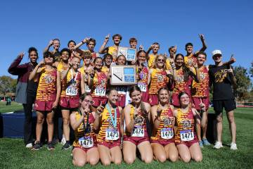 Both the boys and girls Pahrump Valley High School XC program captured the Class 3A Southern Re ...