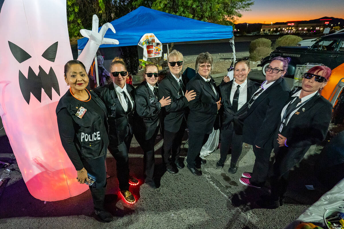 At the Smith’s trunk-or-treat location employees of the grocery store were dressed as the Men ...