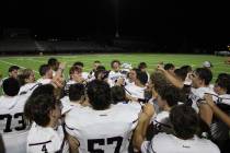 The Pahrump Valley High School football team celebrates after a road win against Cheyenne High ...