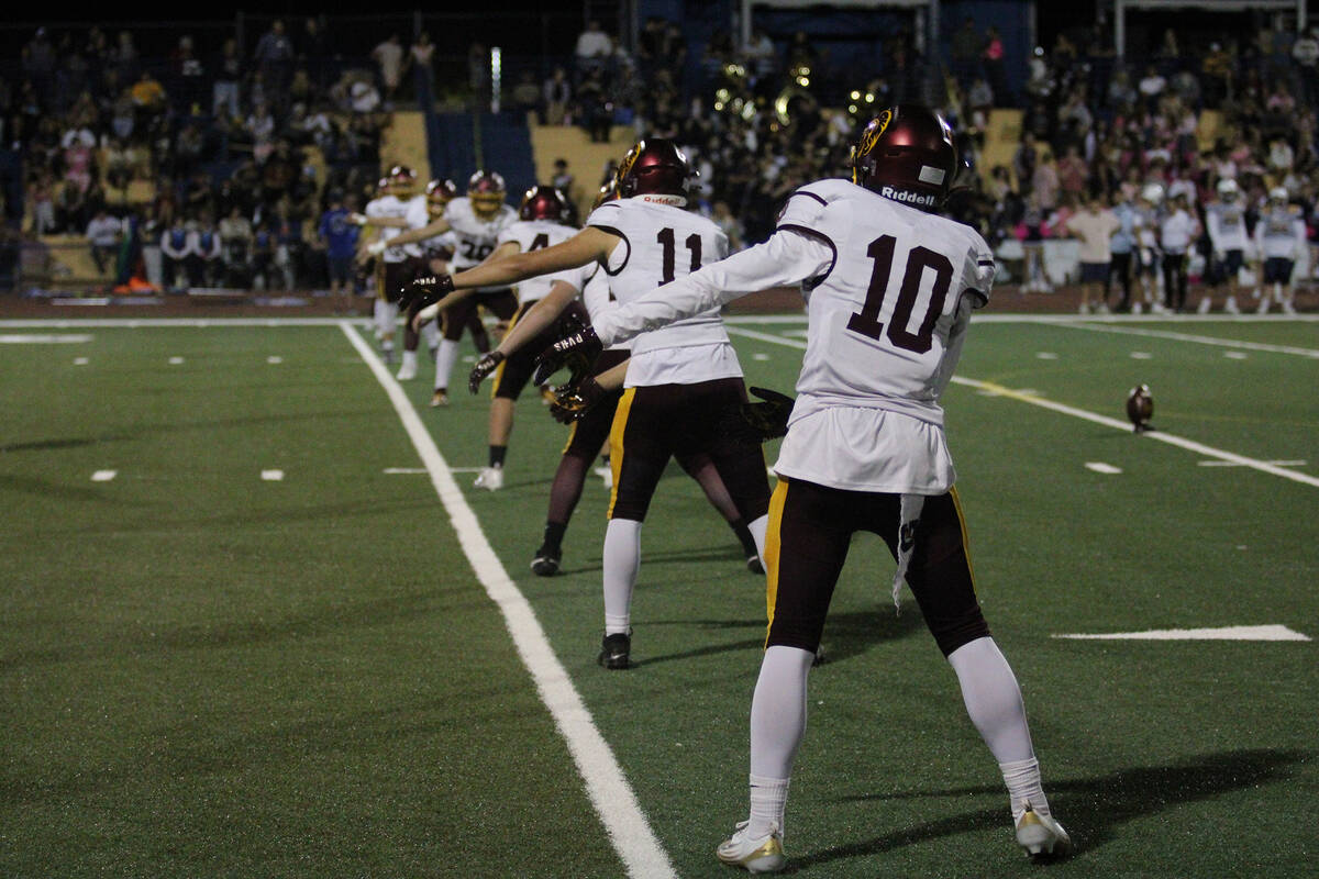 The PVHS football special teams units prepares for kickoff doing their famous "Slusher" chant b ...