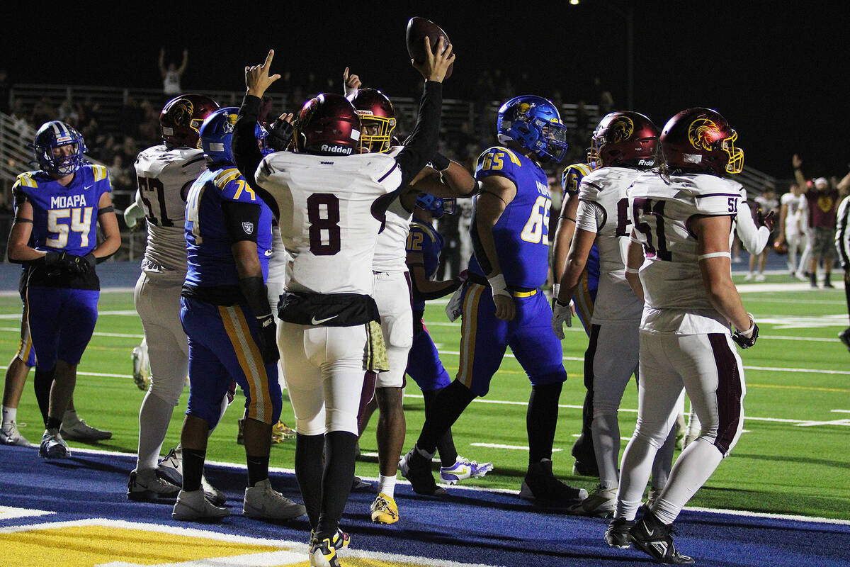 PVHS senior quarterback Kayne Horibe celebrates with his team and community in the stands as th ...