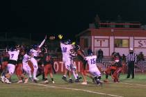 Tonopah High School junior RB/LB Dustin Otteson attempts a point after try during the Muckers 9 ...