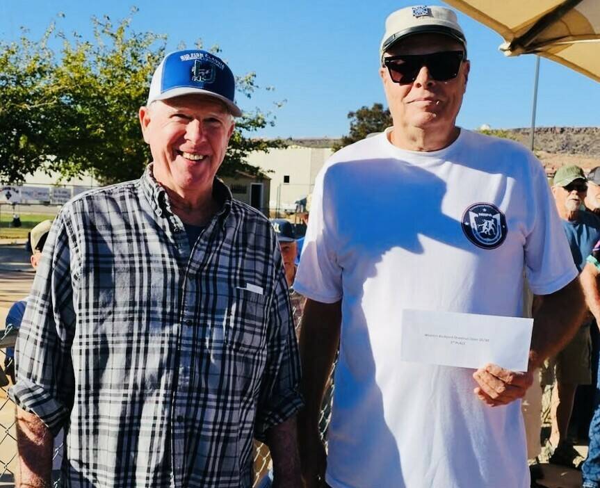Horseshoe pitching partners Benj Rains (left) of Panguitch, Utah and Lathan (Rebel) Dilger (rig ...