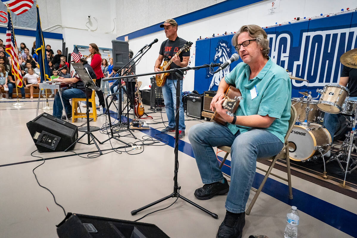 Musician Eric Stillman and local band No Way Out performed during the assembly and also helped ...