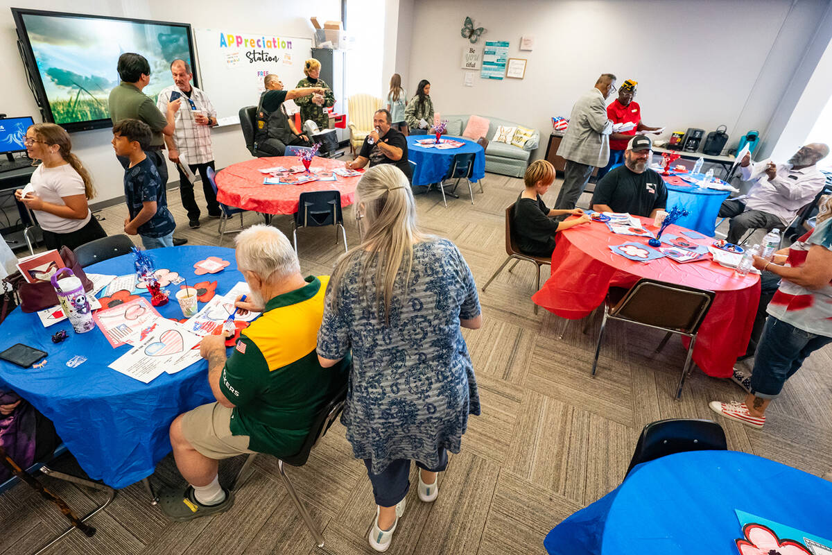After the appreciation assembly ended, veterans were invited into a room next door where they e ...