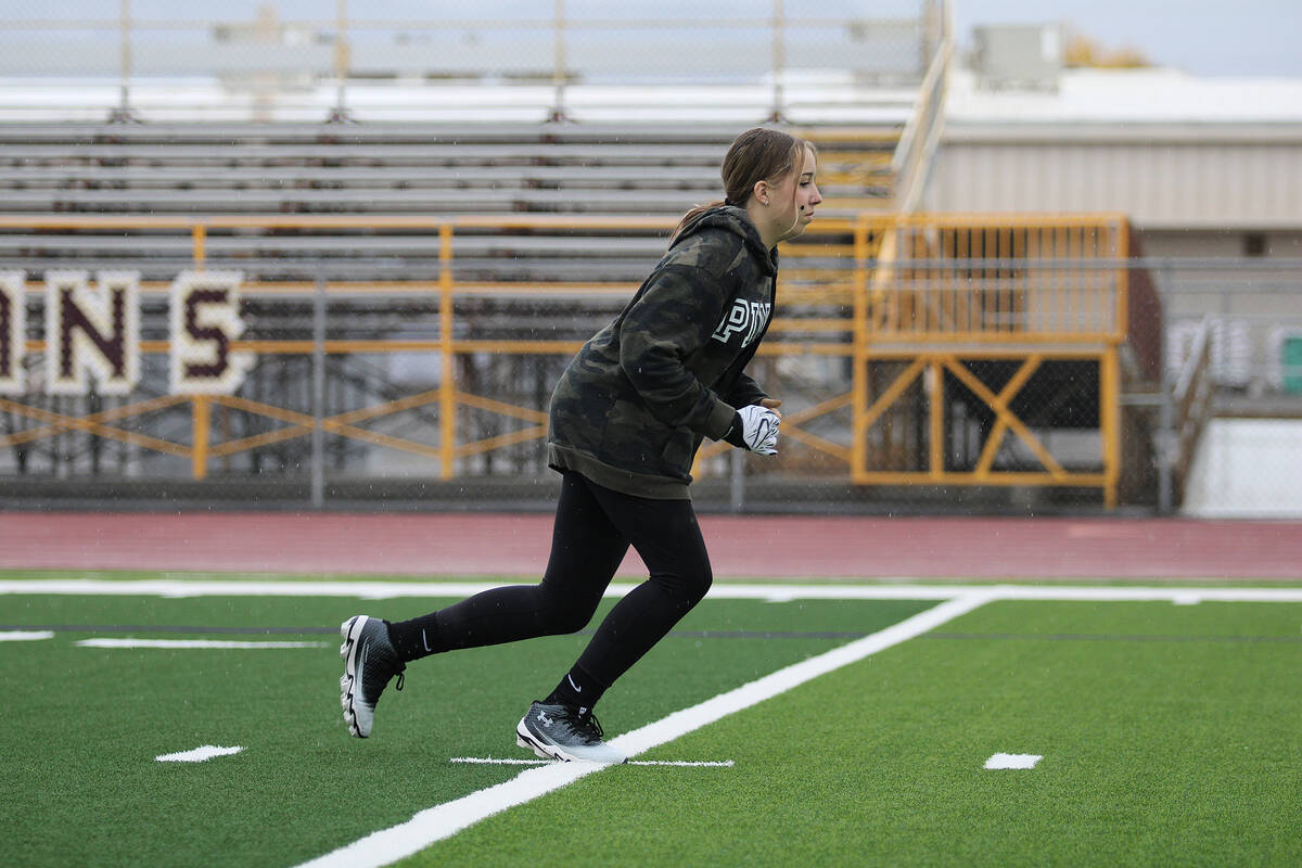 PVHS girls flag football player Teagan Fanning lines up on the line marker before she prepares ...