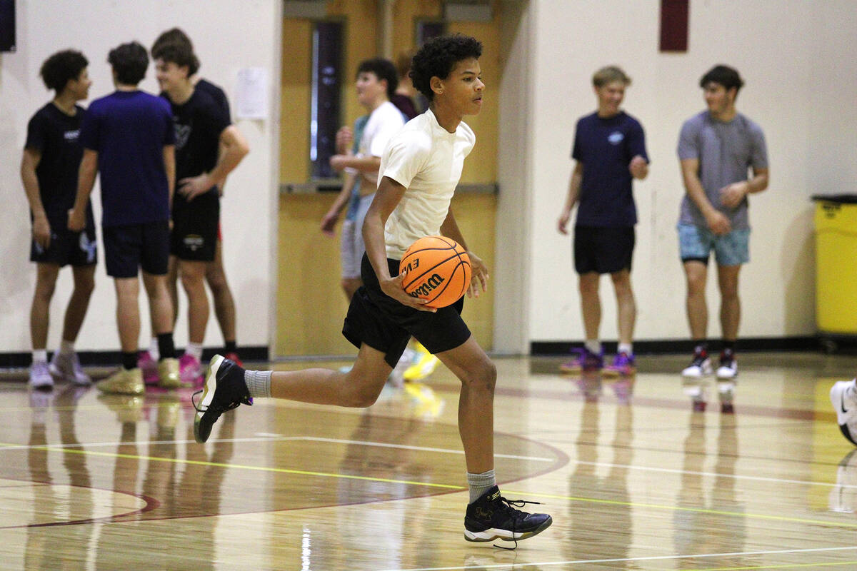 PVHS basketball players try out for the varsity program during the Trojans' first official day ...