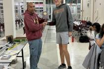 Pahrump Valley High School tennis junior Bryce Dykstra receives the coaches award during the pr ...