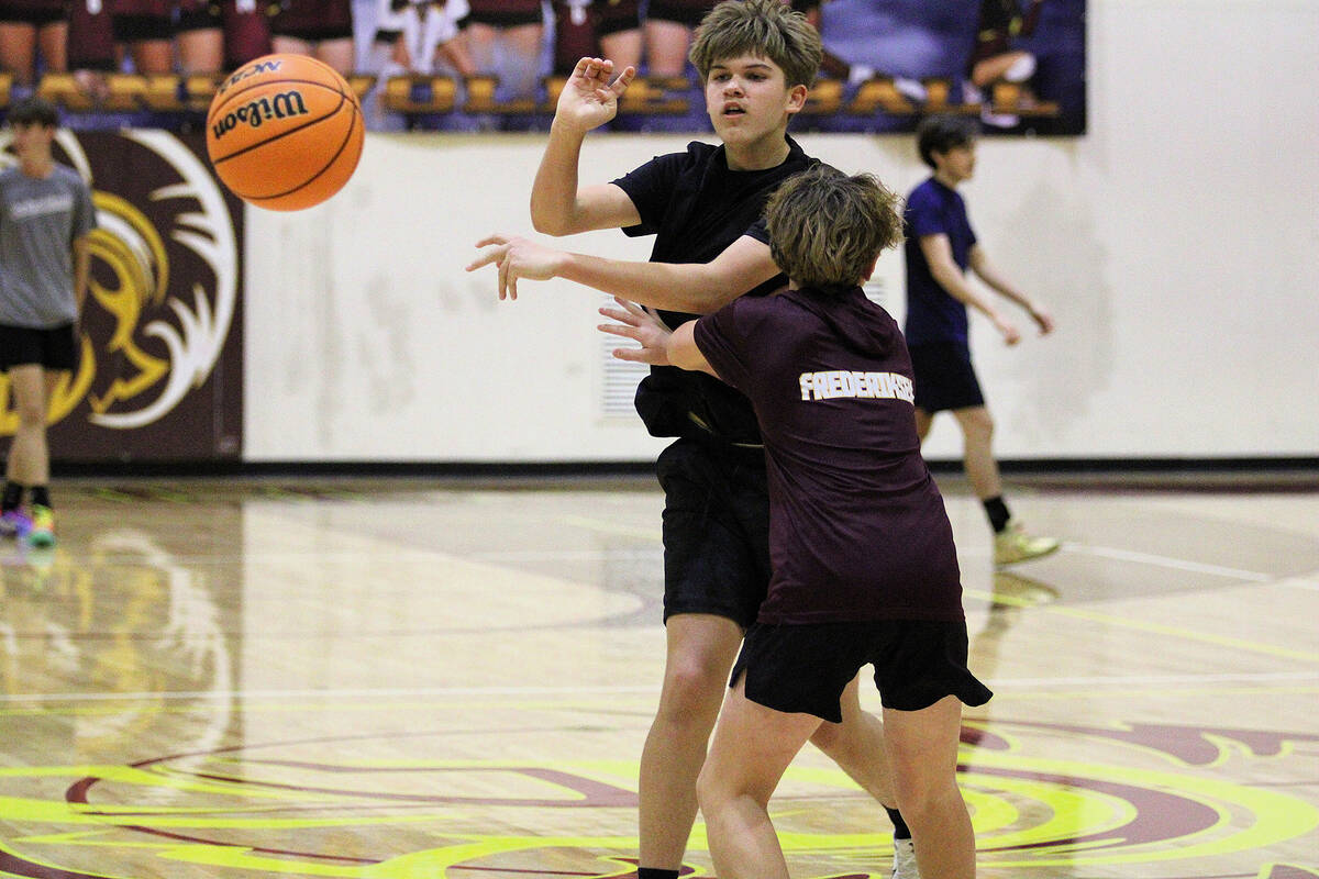 Pahrump Valley High School basketball athletes try out to make the Trojans varsity basketball t ...