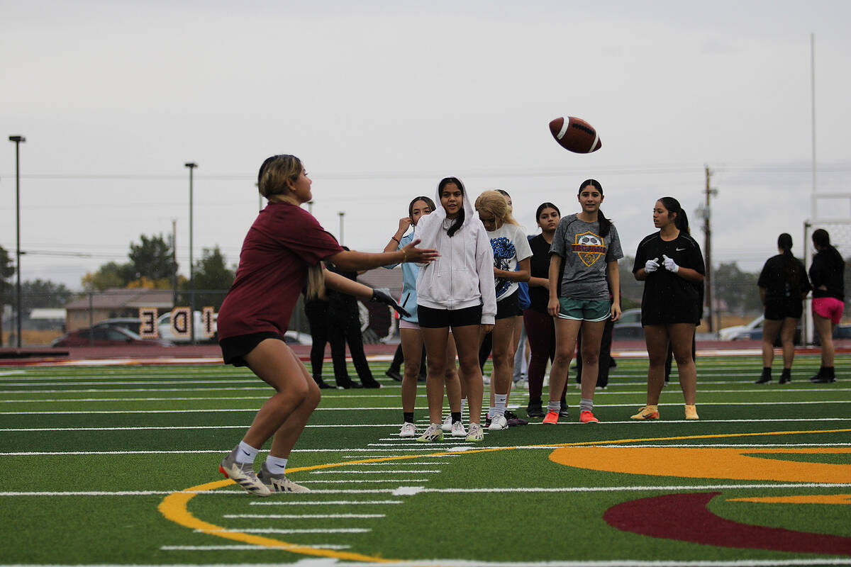 Ladies that have been working out with Trojans flag football head coach Jeff Corbett tryout in ...