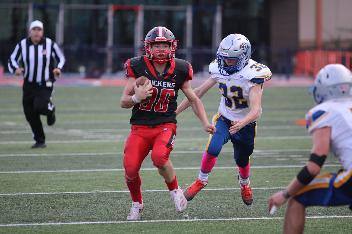 Tonopah High School junior Dustin Otteson rushed for 157 yards during the Class 1A championship ...