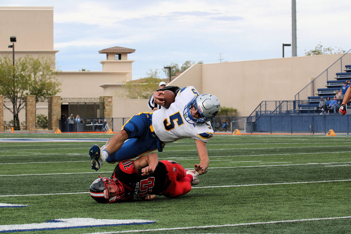 Tonopah High School junior Dustin Otteson makes the stop against Pahranagat Valley senior Jesse ...