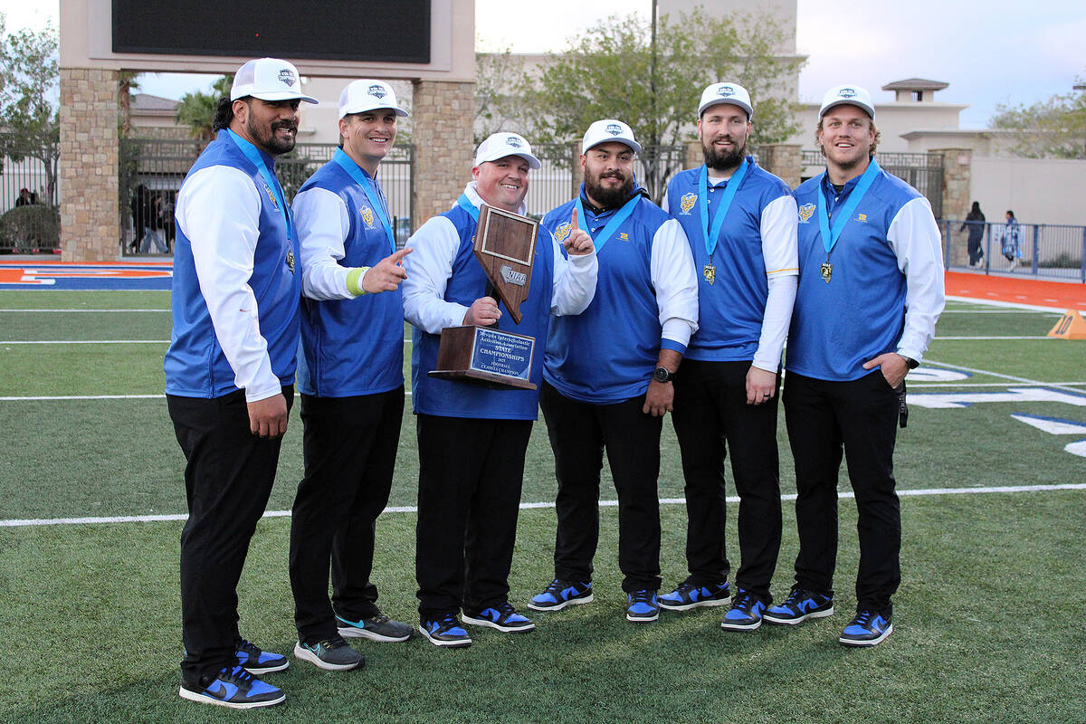 Pahranagat Valley High School head coach Brett Hansen and his coaching staff celebrate capturin ...