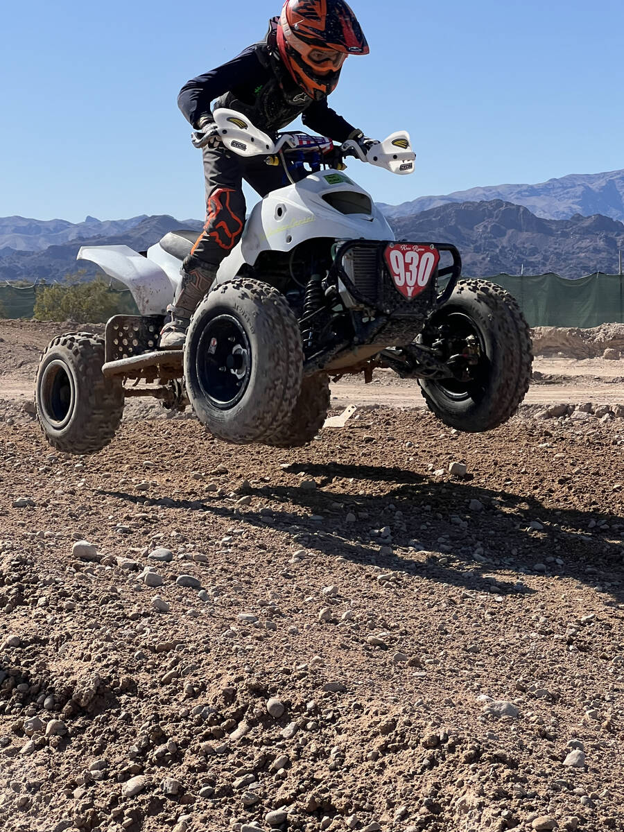 Local youth athlete Kroi Ryan makes a jump on his ATV while out riding. (Nicole Ryan/Special to ...