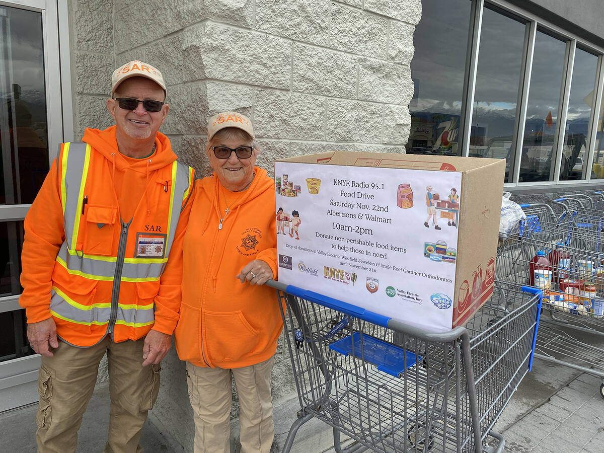 Southern Nye County Search and Rescue members have been a big part of the KNYE Radio Food Drive ...
