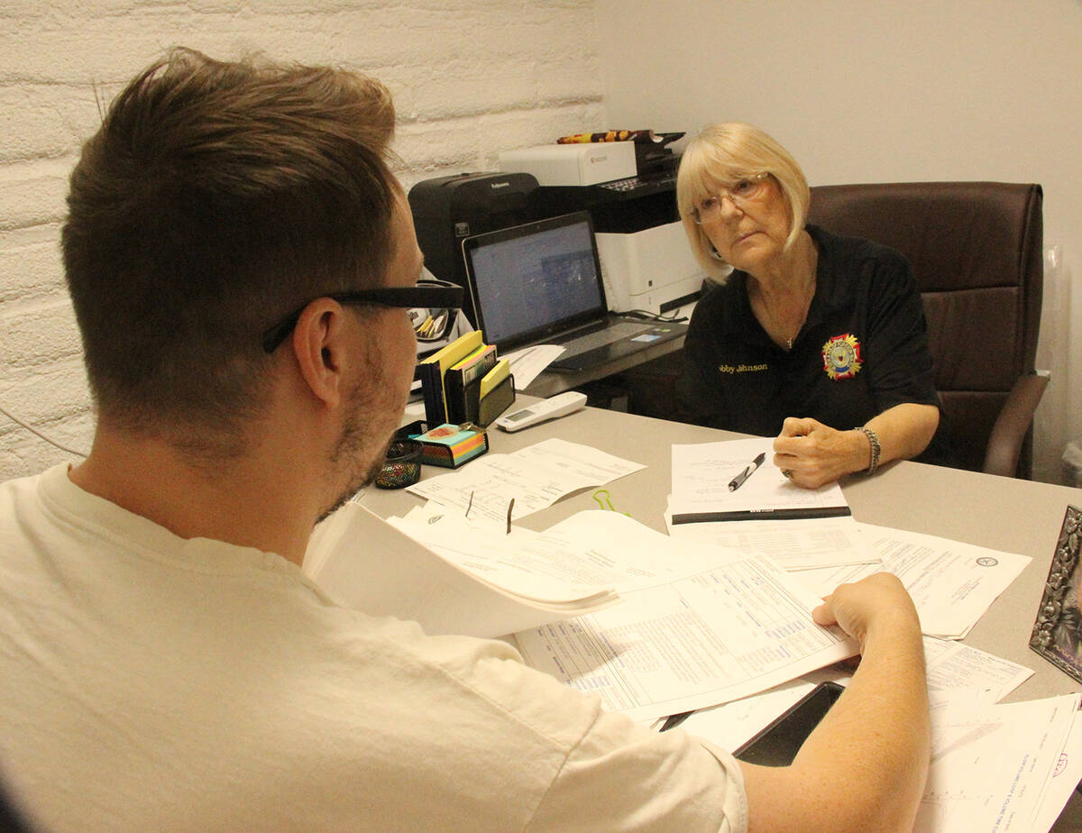 Debra Johnson, a Veterans of Foreign Wars (VFW) accredited claims consultant, helps veterans in ...
