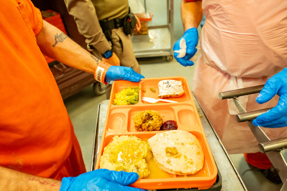 Individual trays with turkey, stuffing, mashed potatoes, gravy, mixed veggies, cranberry sauce, ...