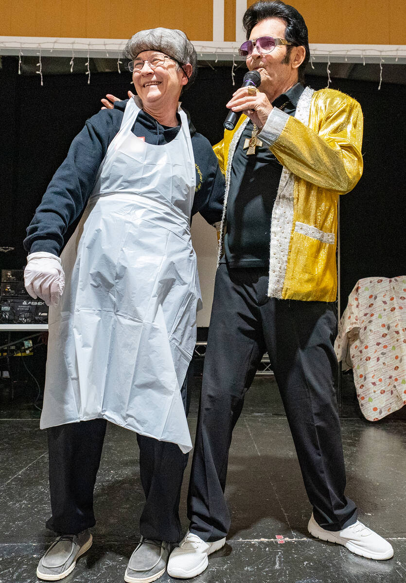 Local Elvis Impersonator Johnny V was on hand at the Community Thanksgiving Dinner to serenade ...