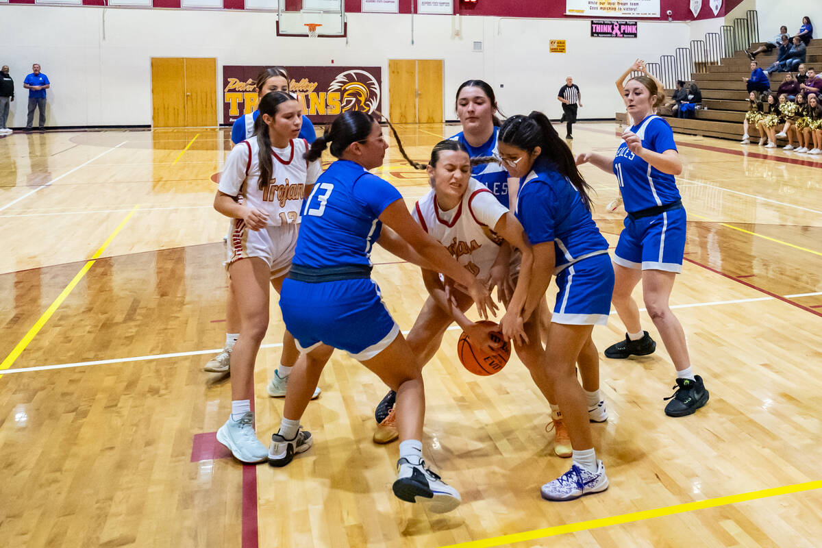 Pahrump Valley High School varsity girls basketball junior point guard Riley Saldana moves thro ...