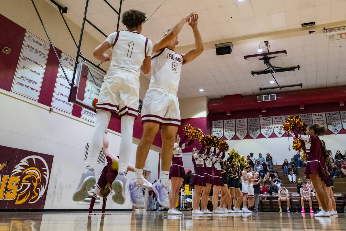 Pahrump Valley High School senior Kiers Sheppard and Joshua Slusher catch some air during their ...