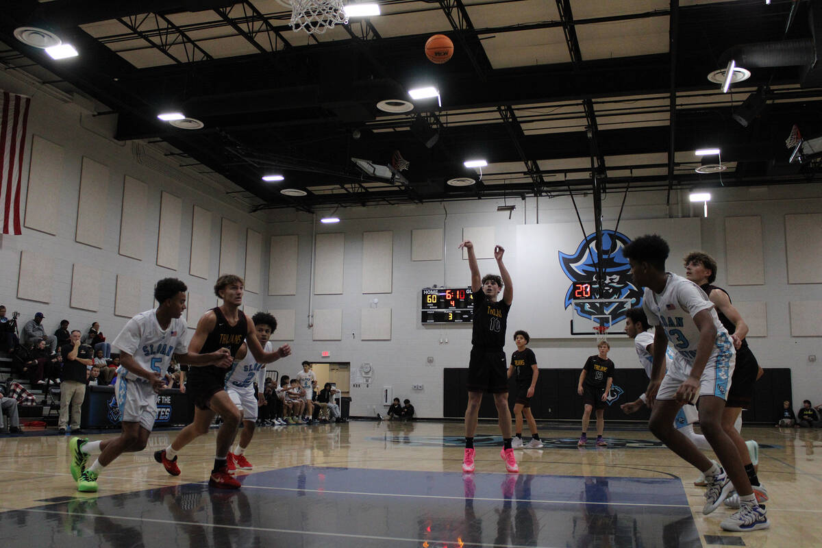 Pahrump Valley High School junior guard Lucas Gavenda is sent to the line once more in the Troj ...