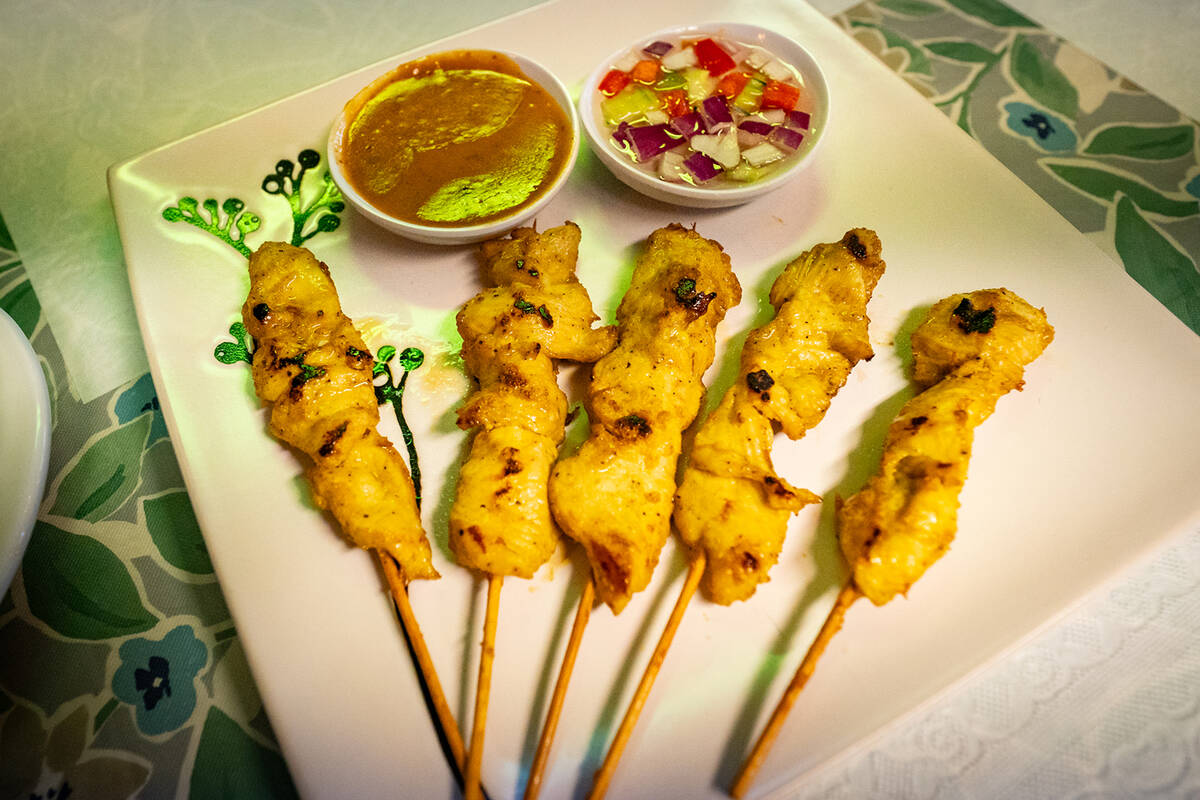 The chicken satay at Romi Thai is tender and served with accompanying sauces. (John Clausen/Pah ...