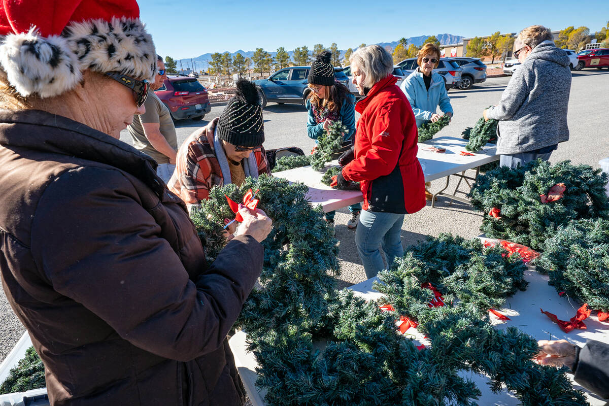 The Nevada Silver Tappers spent the morning of Friday, Dec. 5 cleaning and sprucing up Christma ...
