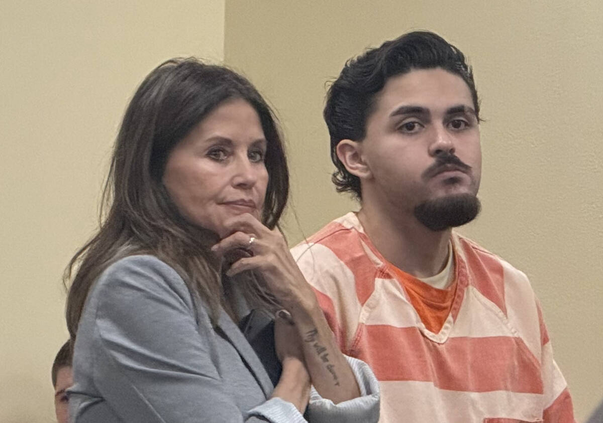 Fabian Ferrante and his attorney, Ava Bravo, listen to Senior Deputy District Attorney Keith Br ...