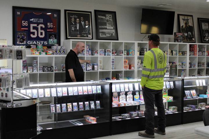 Pahrump Sports Cards shop owner Ernie Desaye asks a customer what he is most interested in the ...